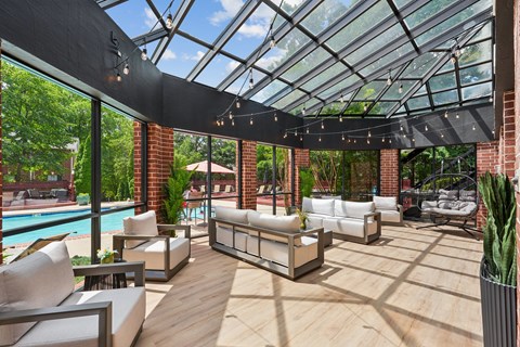 A sunny day at the outdoor patio with a pool.