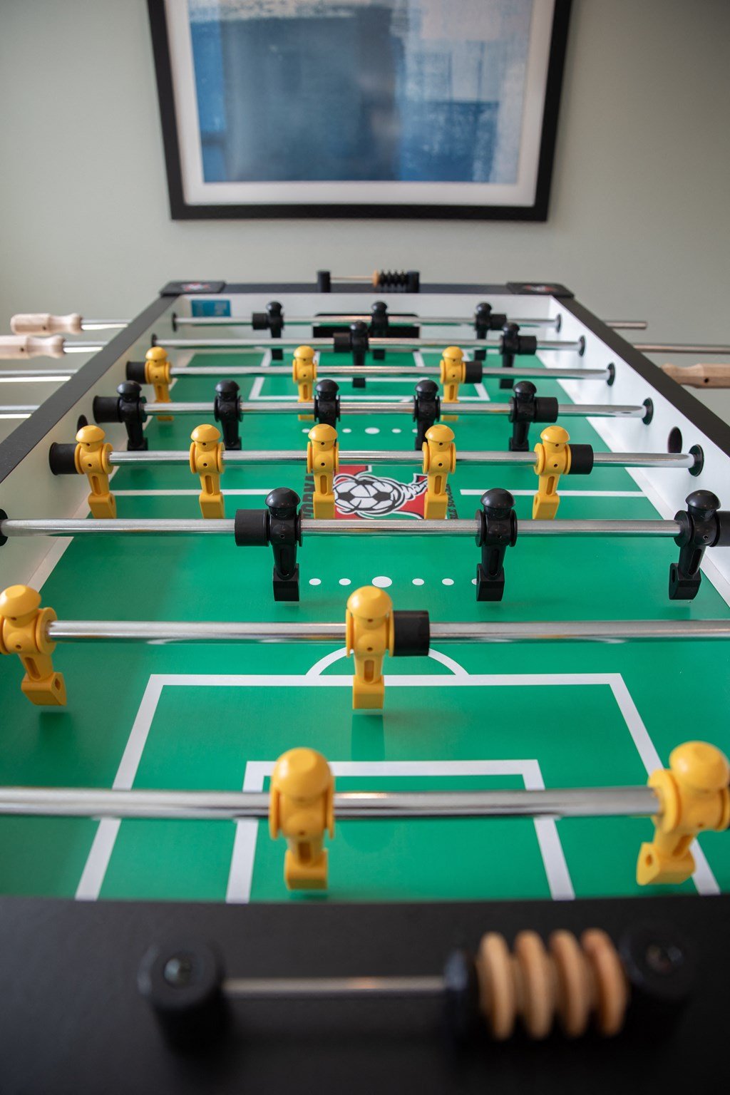 a foosball table on a table in a room