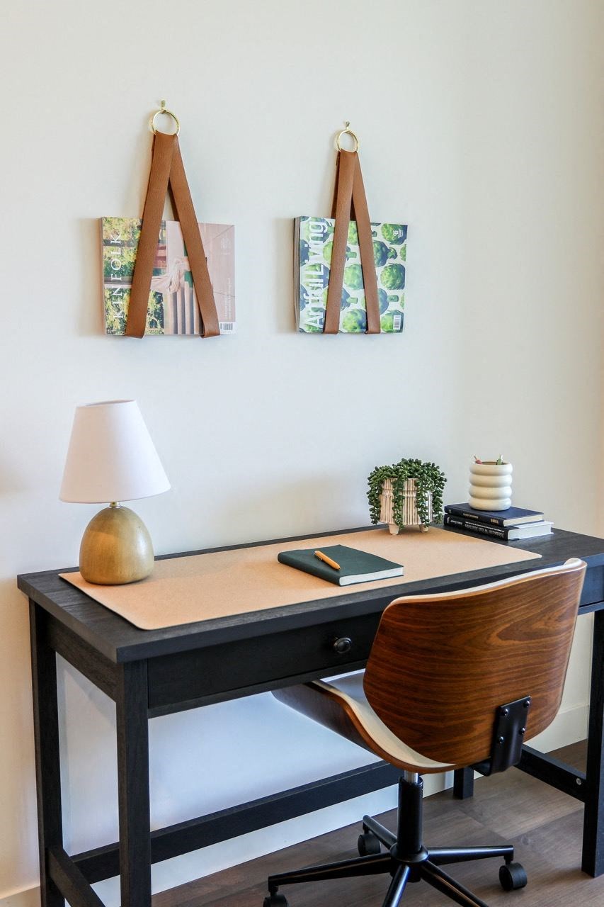 a home office with a desk and a chair