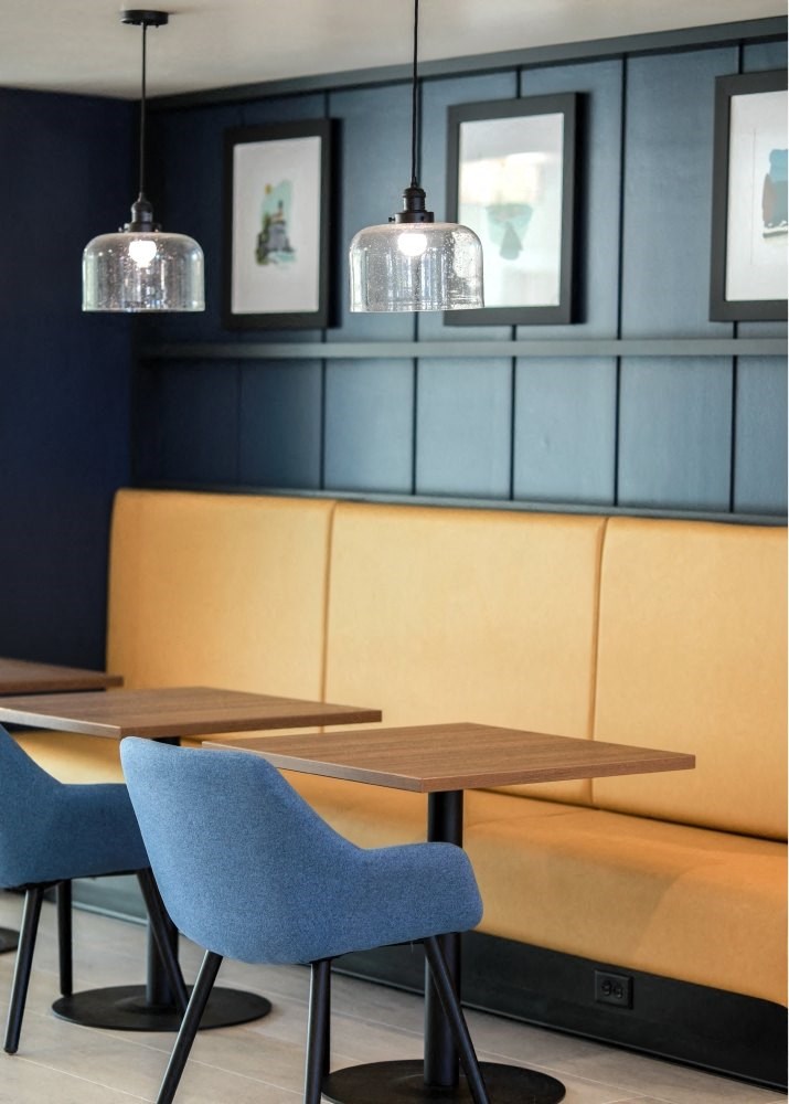 a dining room with a table and chairs