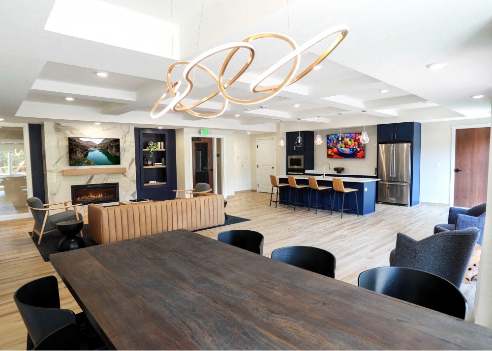 a dining room with a table and chairs and a fireplace