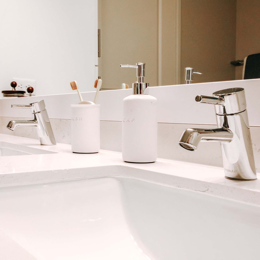 a bathroom with a sink and a mirror