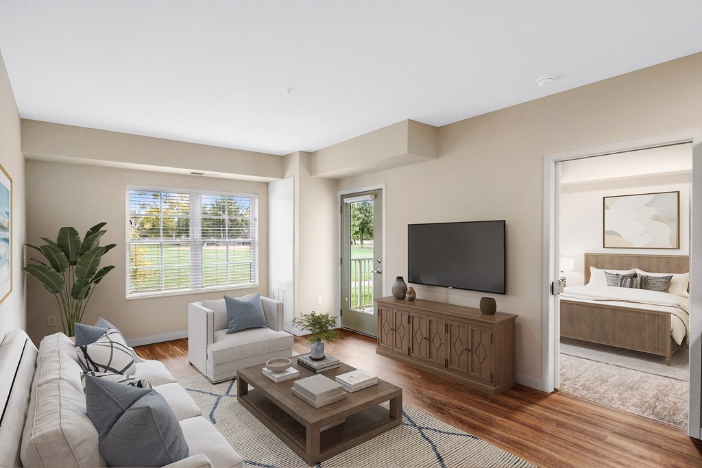 a living room with a couch and a tv