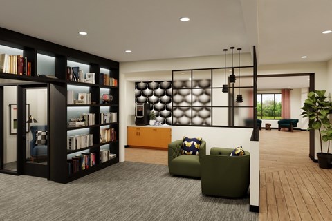 A modern living room with a green sofa and a bookshelf filled with books.