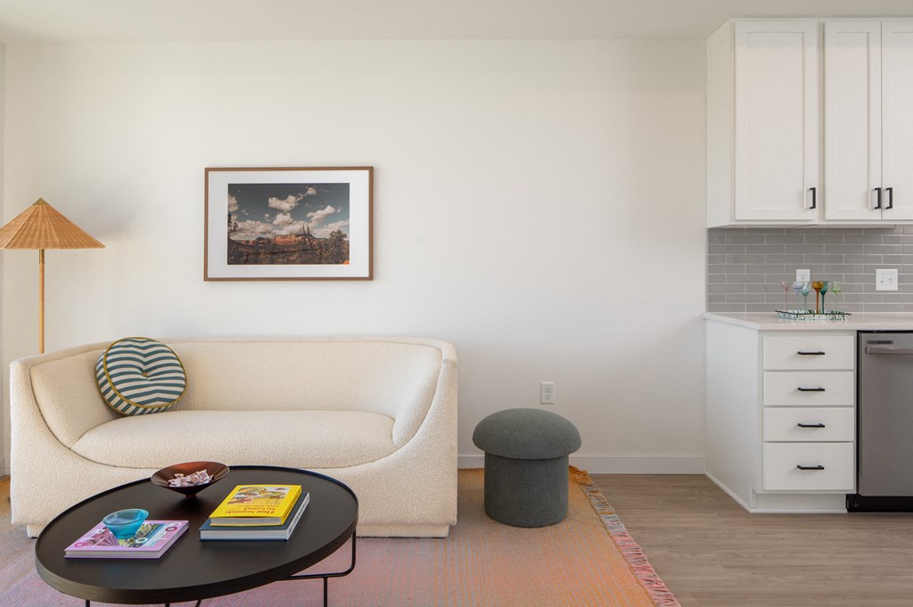 a living room with a couch and a coffee table