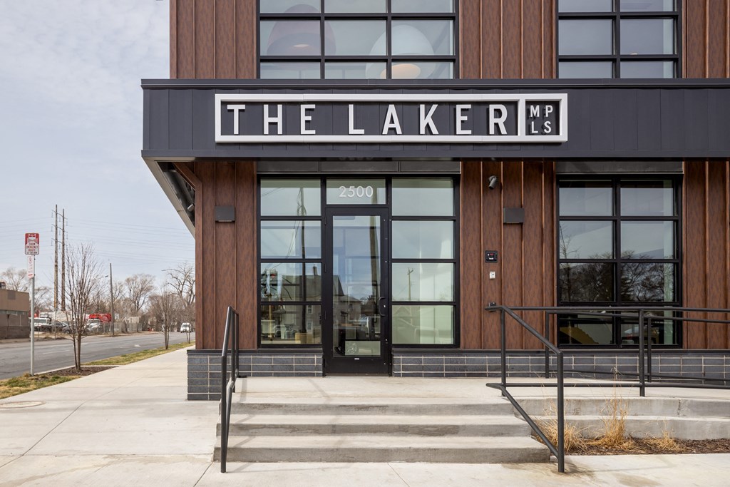 the lobby with stairs in front of a building