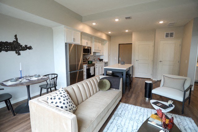 a living room with a couch and a table