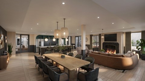A modern dining room with a fireplace and a large wooden table.