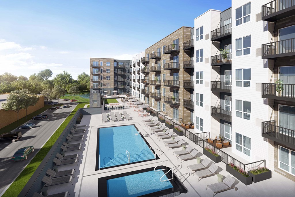 a rendering of an apartment building with a swimming pool