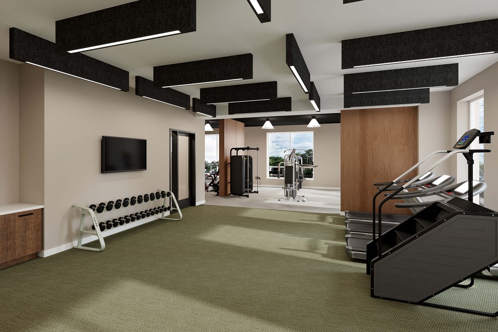 a rendering of a gym with treadmills and a tv