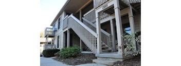 a view of the outside of a building with stairs