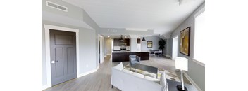 a living room with a couch and a table