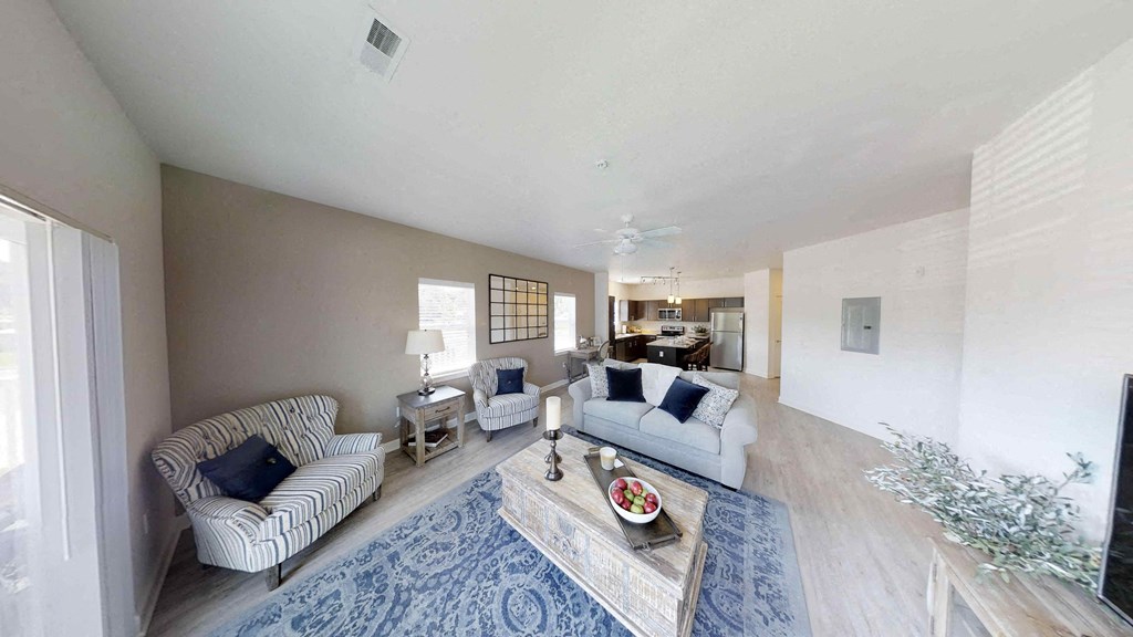 a living room with two couches and a coffee table