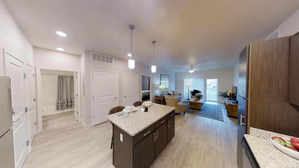 a kitchen and living room in a new home