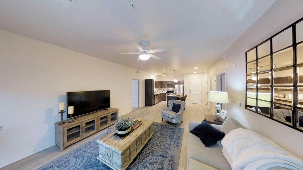 a living room with a couch and a tv