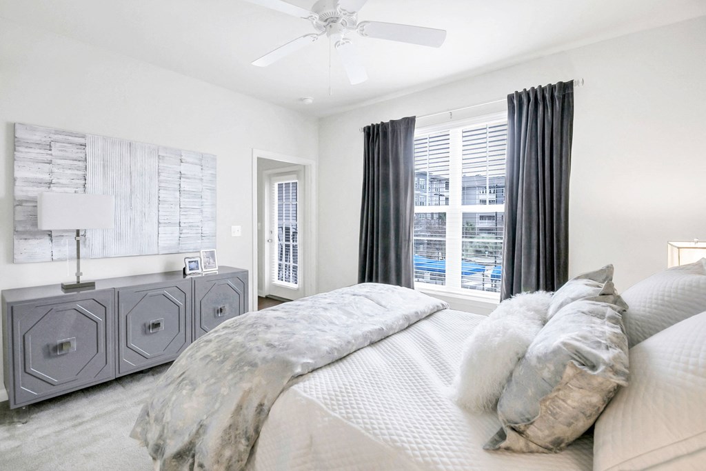 Bedroom With Pool Views at The Residence at Marina Bay, South Carolina