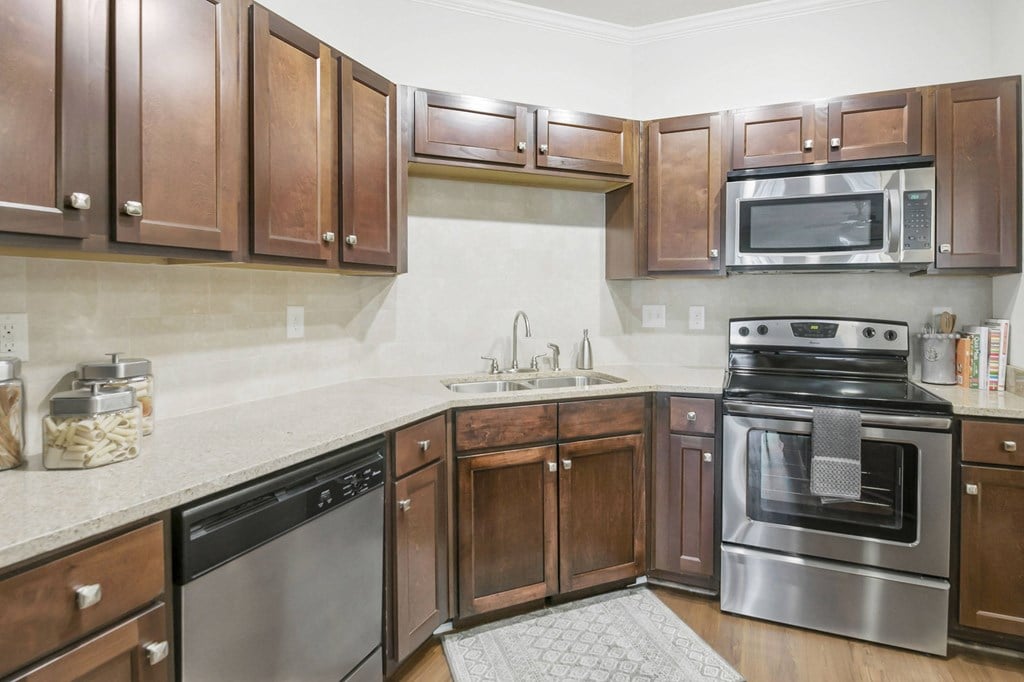 Large open kitchen with stainless steel appliances at The Residence at Marina Bay, Irmo, SC