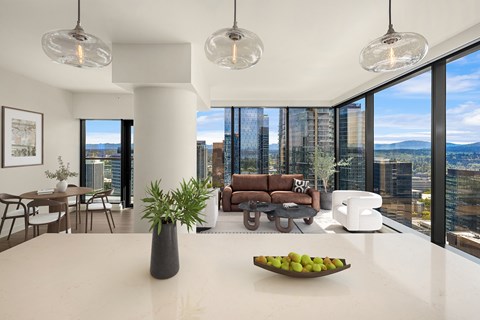 A modern living room with a view of the cityscape.