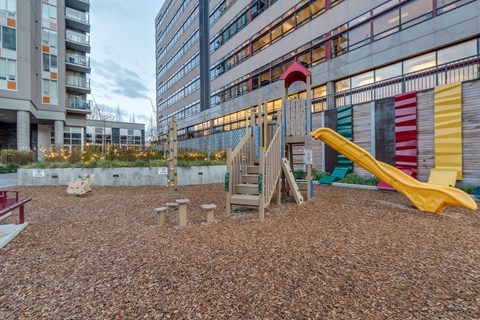 a playground in front of a building