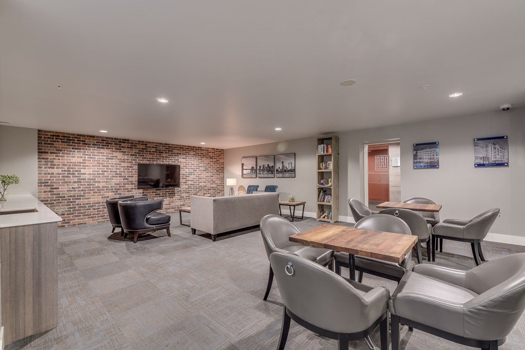 the reserve at bucklin hill clubhouse resident lounge with couches chairs and tables