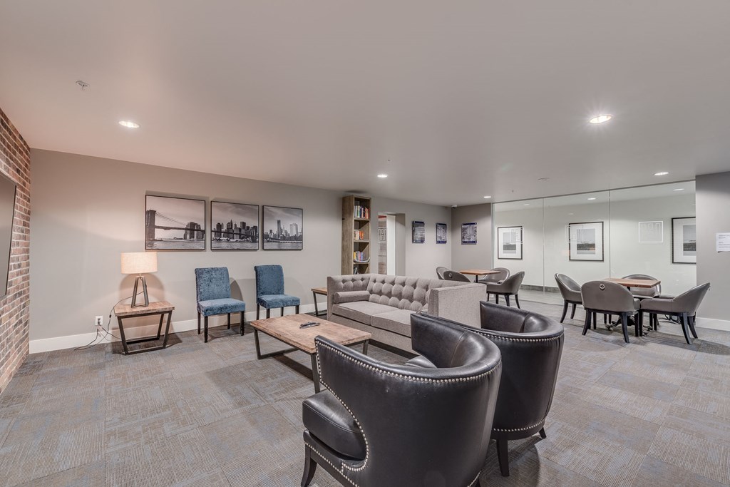 the reserve at bucklin hill clubhouse resident lounge with couches chairs and tables