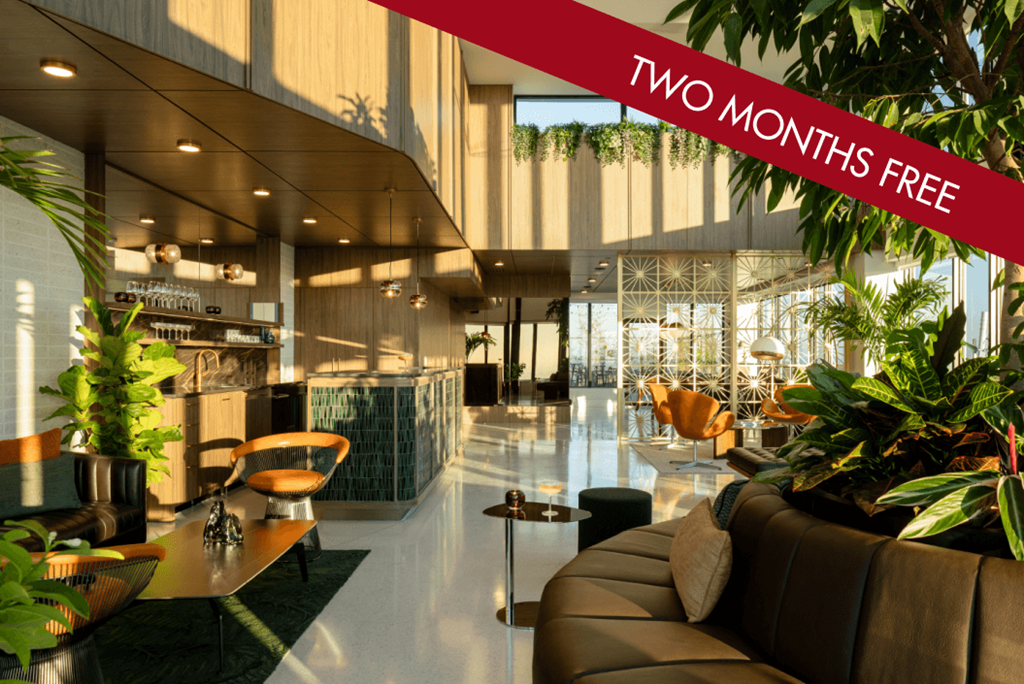 A red banner with the text "TWO MONTHS FREE" is displayed over a modern interior space.