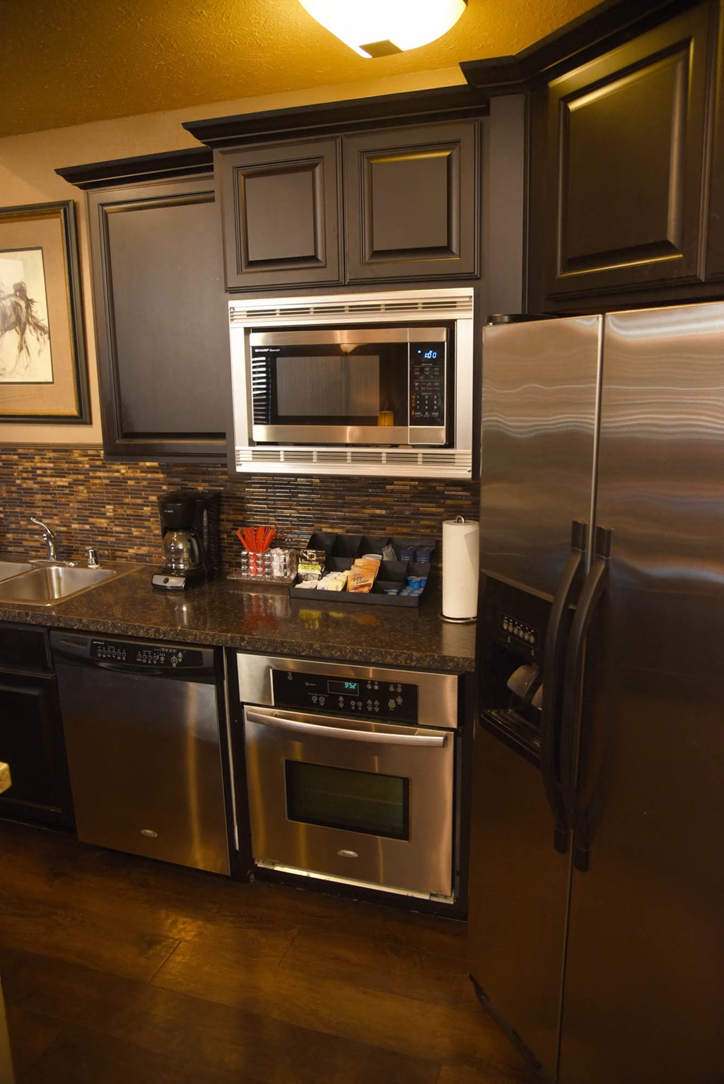 Yellow lights in the kitchen at Graymayre Crossing Apartments, Spokane, WA, 99208