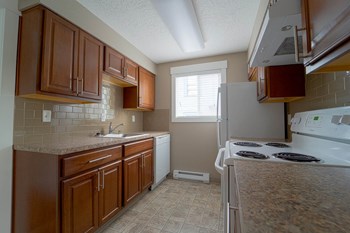 Modern Kitchen With Custom Cabinet at Railhead Apartments, Washington - Photo Gallery 10