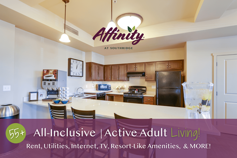 A kitchen area with Affinity at Southridge logo on the wall.