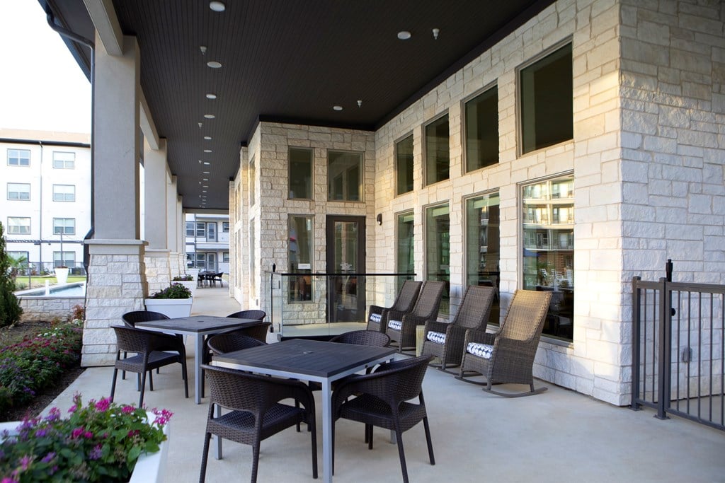 A patio with a table and chairs is shown.