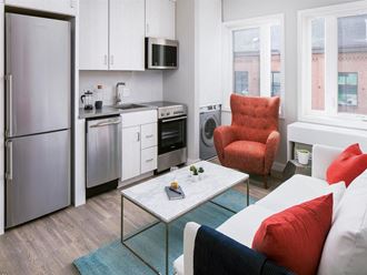 a living room with a couch and a table