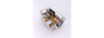 A top-down view of a living room with a couch, coffee table, and television.