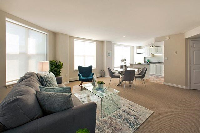 a living room with a couch and a table