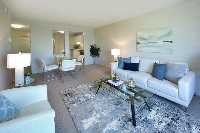 a living room with a couch and a table