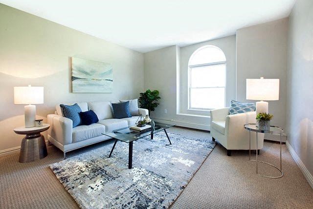 a living room with a couch and a table