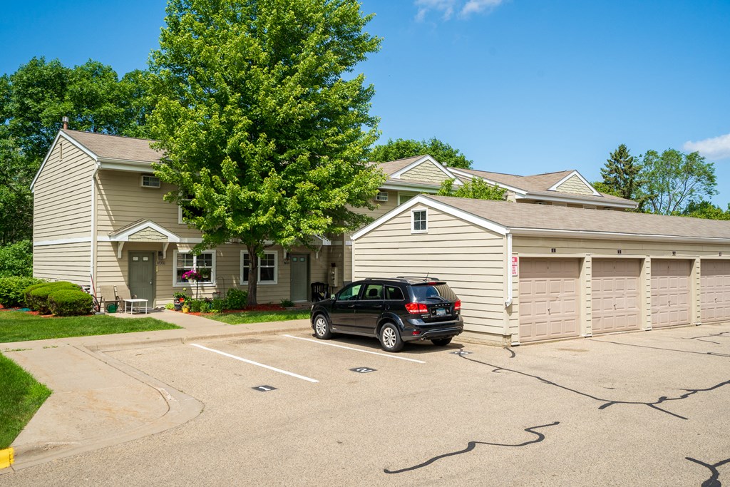 a house with a car parked in front of it