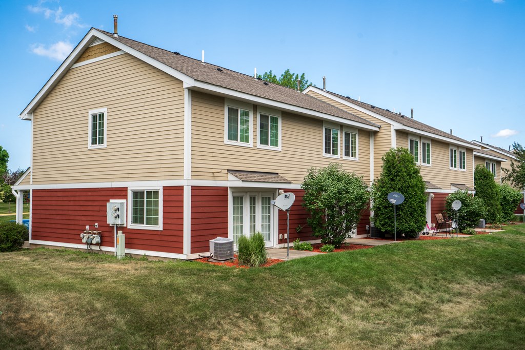 a house with a yard in front of it