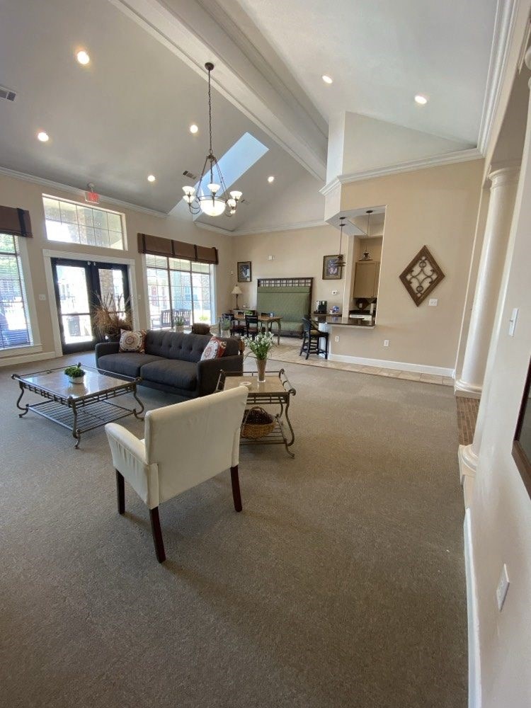 a living room with a couch and a table