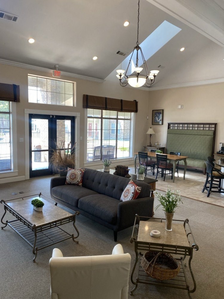 a living room with a couch and a table
