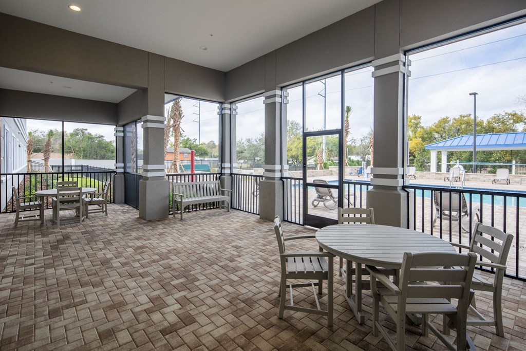 A patio with a table and chairs is shown.
