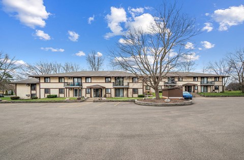 A large parking lot at Santa Vera Apartments in Chanhassen.