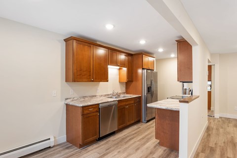 Kitchen with dining area off the living room at Santa Vera Apartments.
