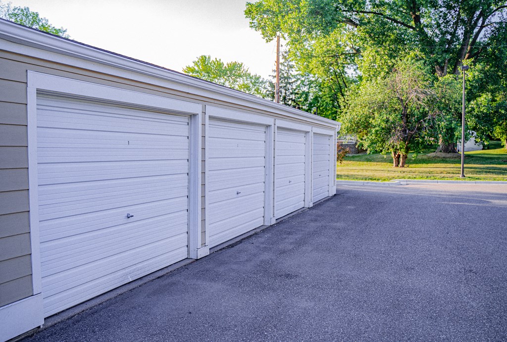 a long white garage door on the side of a building