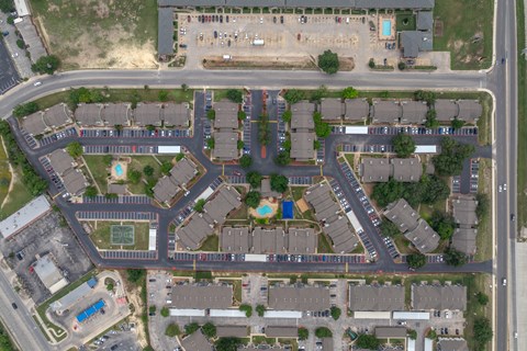 a bird s eye view of a neighborhood with rows of houses
