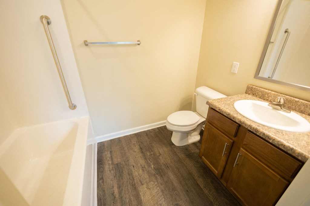 a bathroom with a sink toilet and a shower