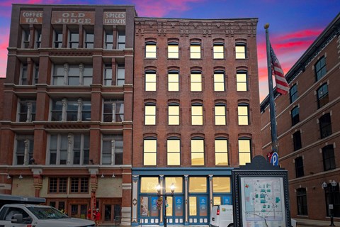 A building with a sign that says Old Spices.