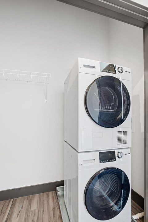 a washing machine and dryer in a room