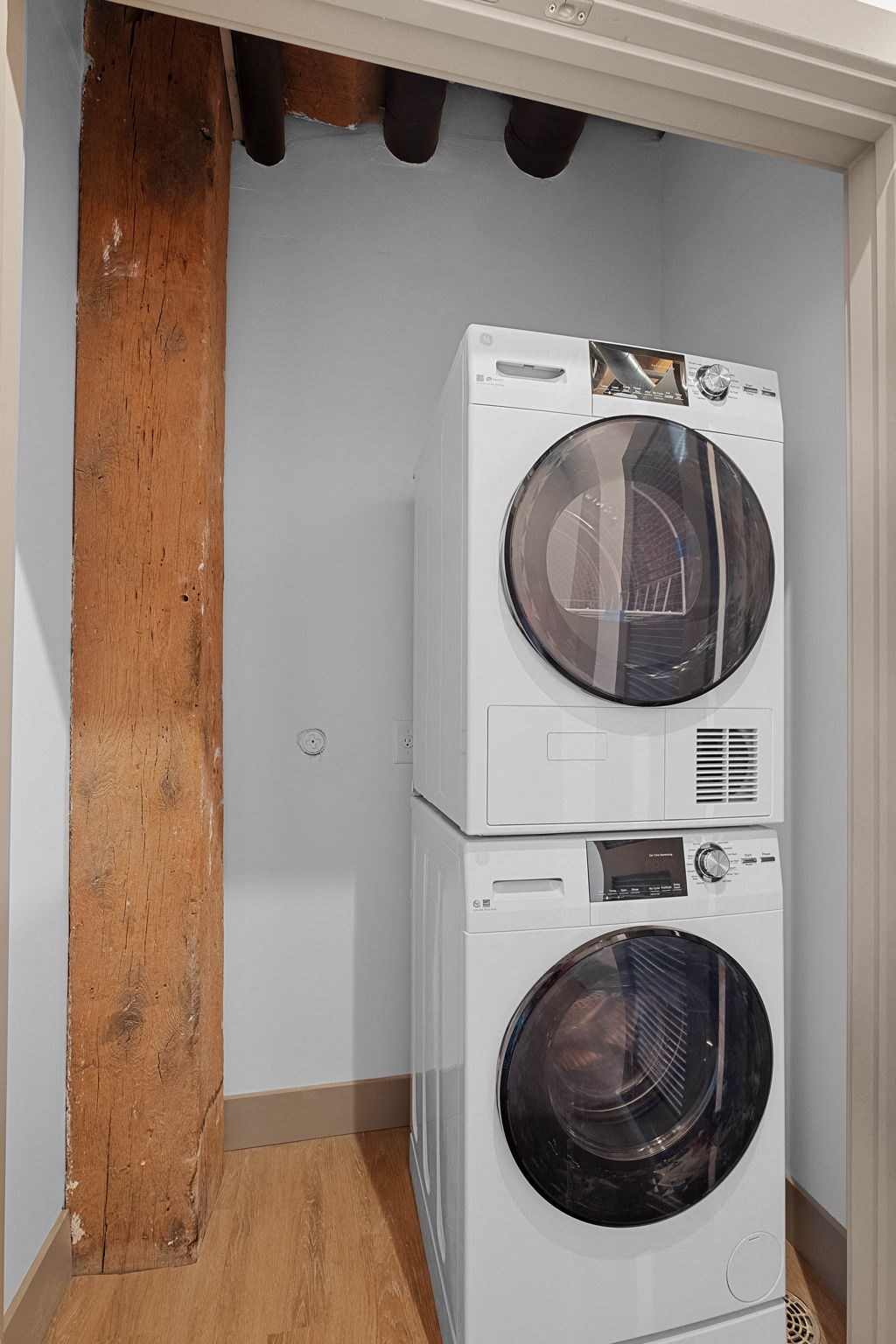 a washing machine and dryer in a laundry room
