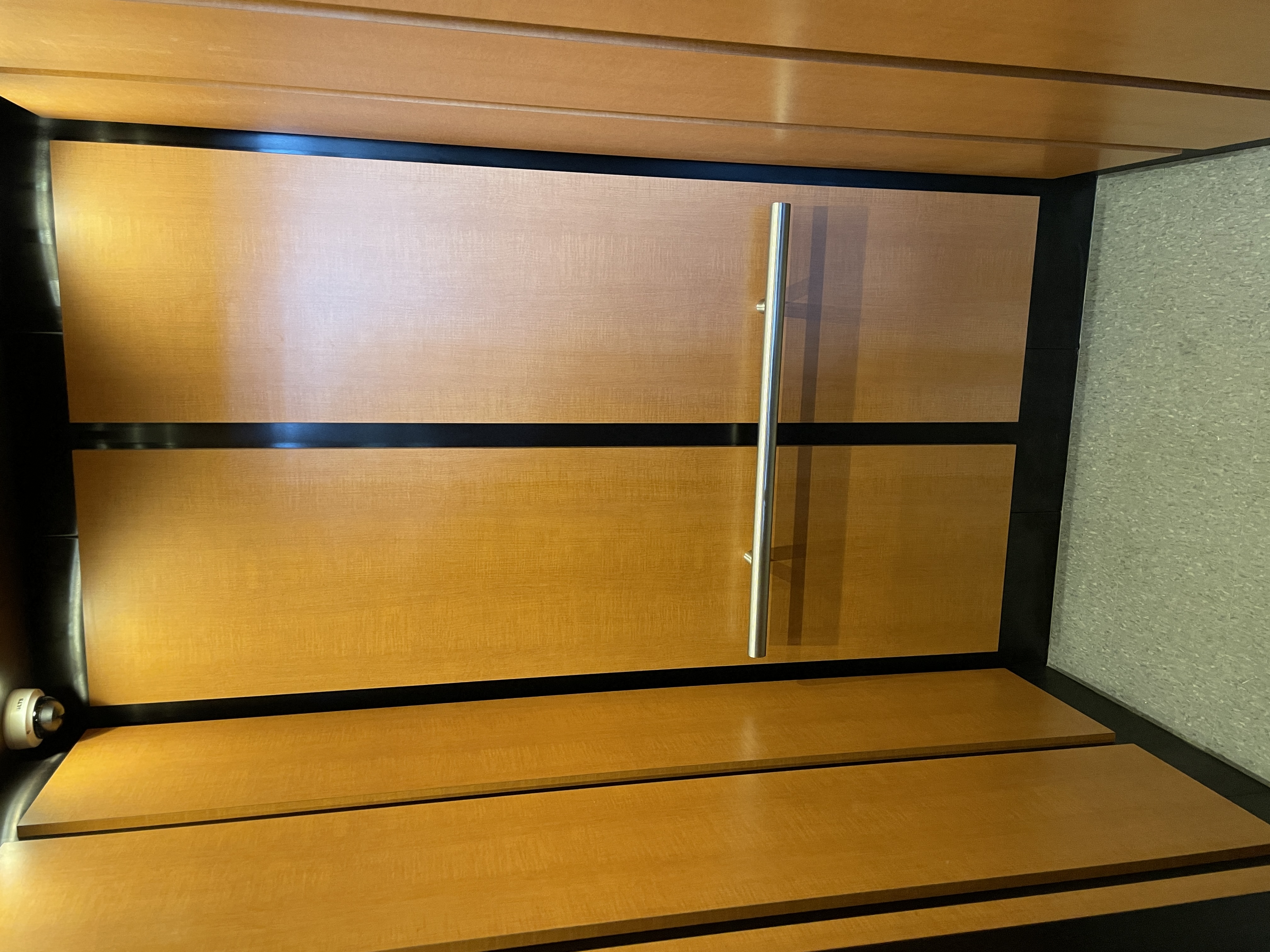 the door to the wardrobe in the closet in the room