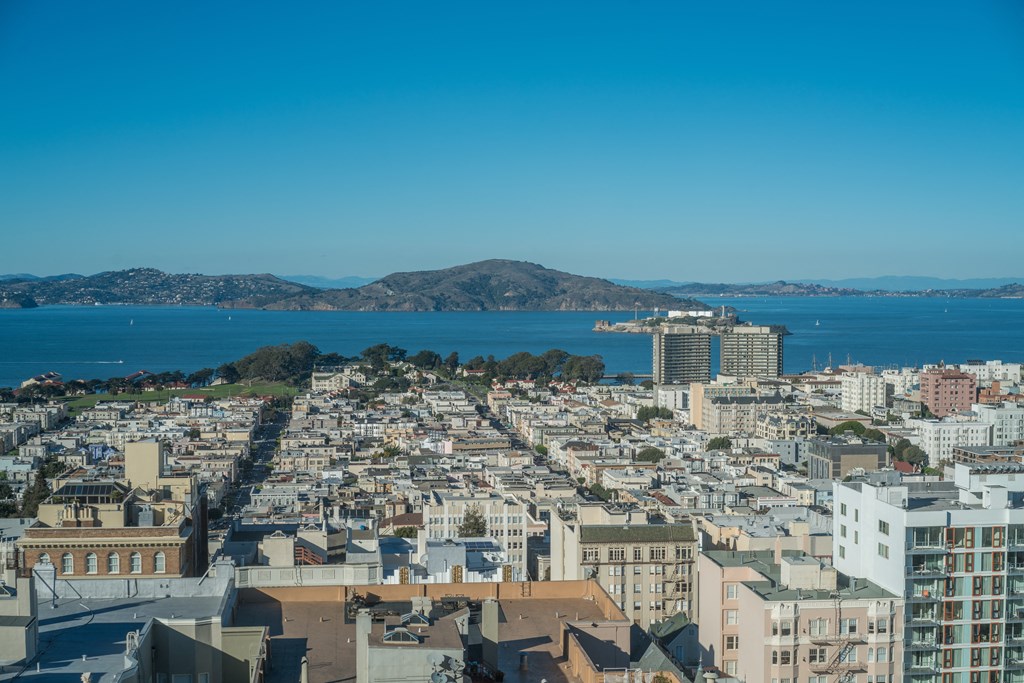 a view of the city and the ocean